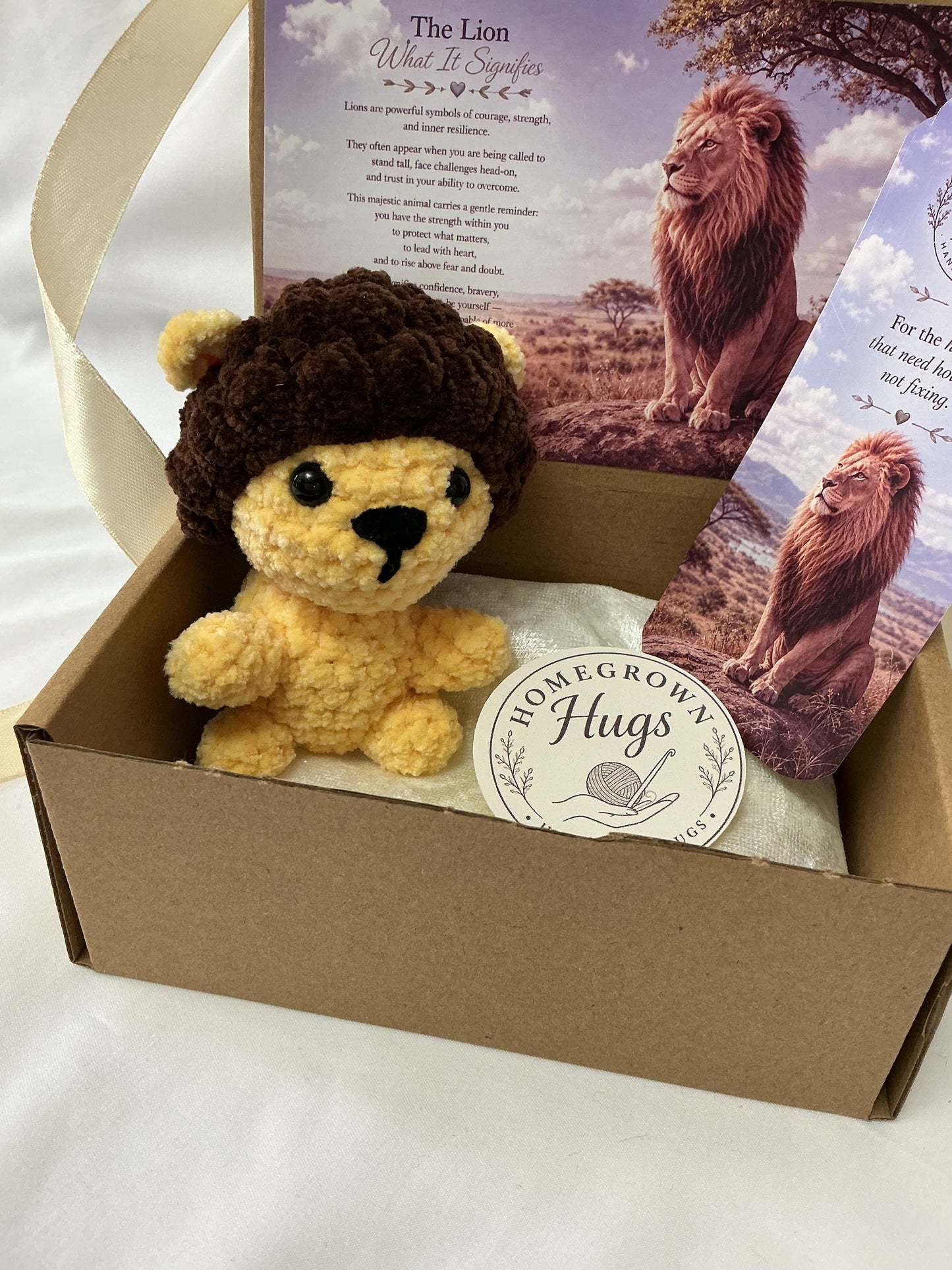 Handheld hugs emotional support lion